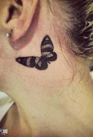 Neck butterfly tattoo maitiro