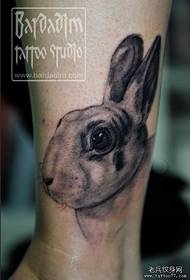 a cute rabbit tattoo work