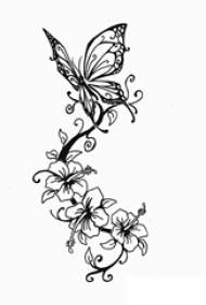 Kupu-kupu ireng lan tanduran tanduran kembang sing apik kanggo tato asli