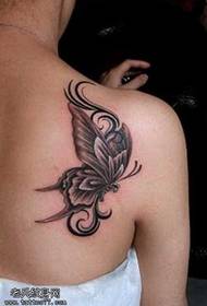 Patrón de tatuaxe de mariposa clásica de tendencia cara atrás