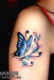 Patrón de tatuaxe de bolboreta azul brazo