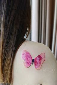 usa ka gipintalan nga butterfly tattoo sa abaga