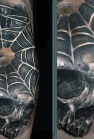 black impressive skull with spider web tattoo pattern
