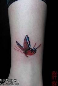 Benfärg fjärils tatuering mönster