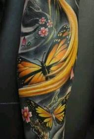 小さな腕黄色蝶のタトゥーパターン