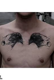 Tato burung berkepala dua di bagian dada