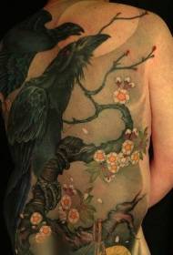 Black crow tattoo pattern on back flower tree