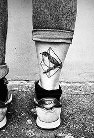 Tatuatu di uccello nantu à l'ankle