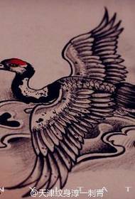 Crane tattoo manuskriptbillede