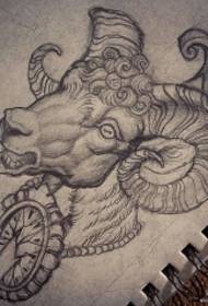 European at American antelope head clock tattoo tattoo na manuskrito