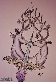Model de tatuaj cu pumnal antilope manuscris