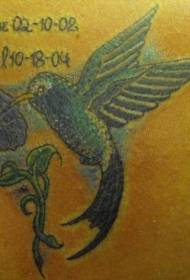 Bulawan nga kolor nga gamay nga hummingbird nga handumanan nga litrato sa tattoo nga tattoo