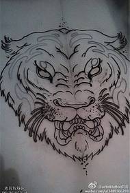 Tiger head tattoo e ngotsoeng ka letsoho