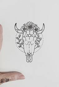 Manuscrito de tatuaxe de flores de cabeza de boi