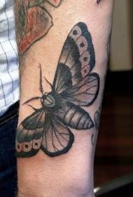 Padrão de tatuagem de braço de mariposa preta