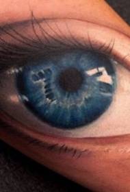 blue eye realistic tattoo pattern on the arm