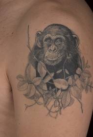Iso kaunis musta orangutanan ja lehtien tatuointikuvio