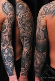 ramię czarno-biała maska w stylu meksykańskim i kompasowy wzór tatuażu