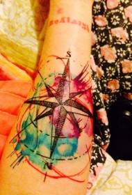 watercolor splash of the compass arm tattoo pattern