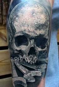 arm very realistic skull with wrench tattoo pattern