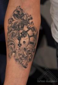 gorgeous black and white ancient clock arm tattoo pattern