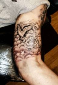 schattige duif met kruis en rozenarm tattoo patroon