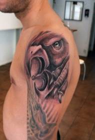 itku Griffinin jumalan pedon tatuointikuvion käsivarressa