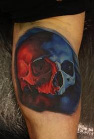 braț Model impresionant de tatuaj de craniu albastru și negru
