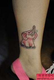 a cute pink elephant tattoo on the ankle