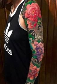 Dažādu nacionālo ziedu peoniju daļu tetovējuma raksts