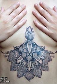Chest lotus tattoo