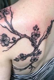 Koulutyttö takaisin mustia piikkejä abstraktit linjat kasvien oksat ja kukat tatuointi kuvia