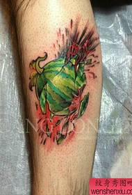A broken watermelon tattoo pattern that is popular in the leg