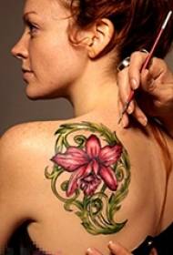 Schoolgirl's back painting technique plant vine literary flower tattoo picture