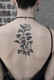 Augalų tatuiruotės modelis ant stuburo