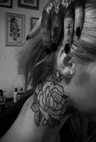 Girl's neck behind black plant material simple line flower tattoo picture