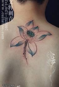 Iphethini ye-retro lotus tattoo ngemuva