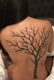 Meisje terug zwart plantmateriaal abstracte lijn leven boom tattoo foto