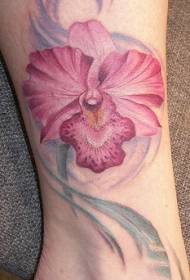 Kadın bacakları renkli pembe orkide dövme deseni