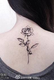 Rose tattoo pattern on the back thorns