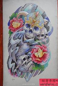 Oibríonn lámhscríbhinn tattoo Taro