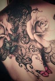 Pizzo nero con motivo tatuaggio schiena rose e farfalle