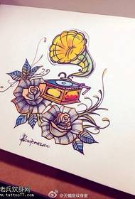 Spalvotas gramofono rožių tatuiruotės rankraščio raštas
