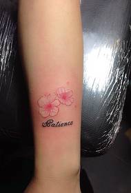 Tattoo pictures of small fresh flowers combined with English