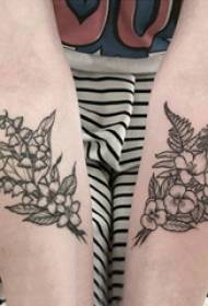 Girl's arm on black line sketch literary beautiful delicate flower tattoo picture