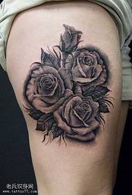 Beautiful rose tattoo pattern on the legs