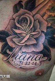 Chest rose tattoo iphethini