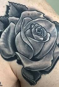 Wzór tatuażu na ramionach czarny szary różany