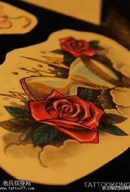 Rose inlaid hourglass manuscript tattoo pattern
