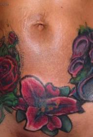 Abdomen prekrasne živopisne raznolike cvjetne uzorke tetovaža